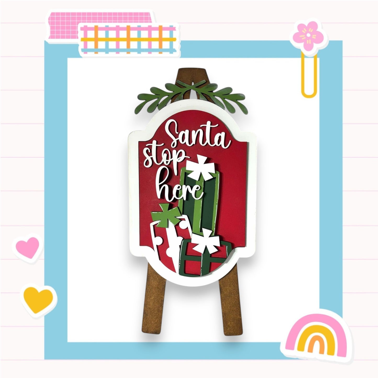 a christmas card with a santa sign on it