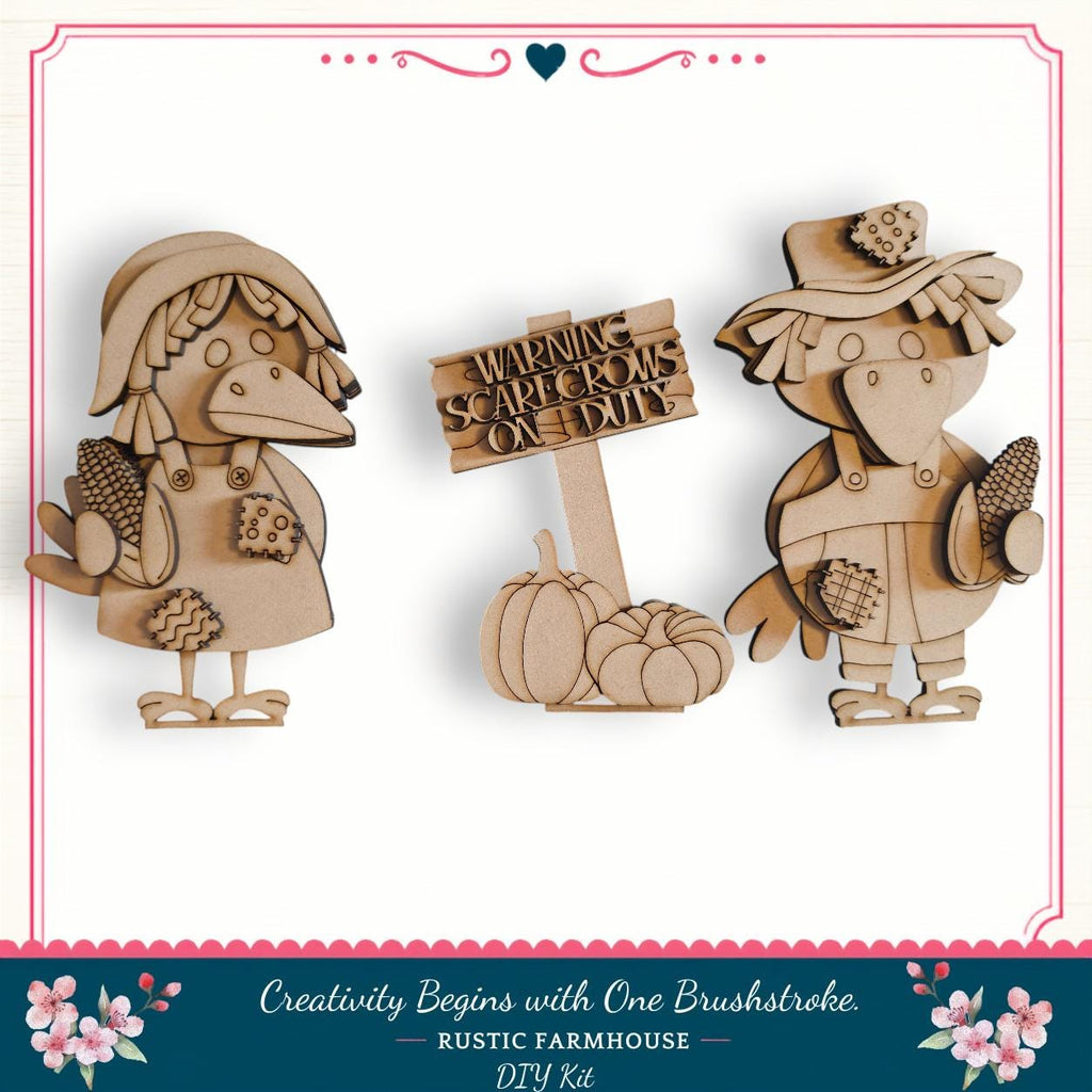 two wooden bird figures, one holding a corn cob and the other holding a sign that reads "WARNING SCAPTERS ON THE DUTY".