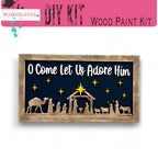 a wooden nativity scene with the birth of jesus