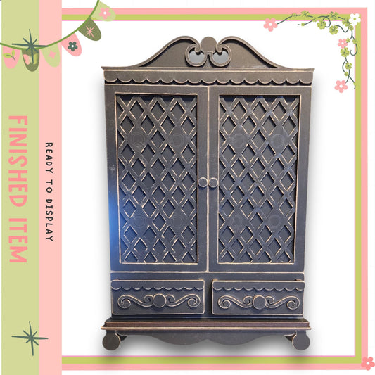 a dark wooden cabinet with intricate lattice work and decorative elements, set against a pink and green floral border.