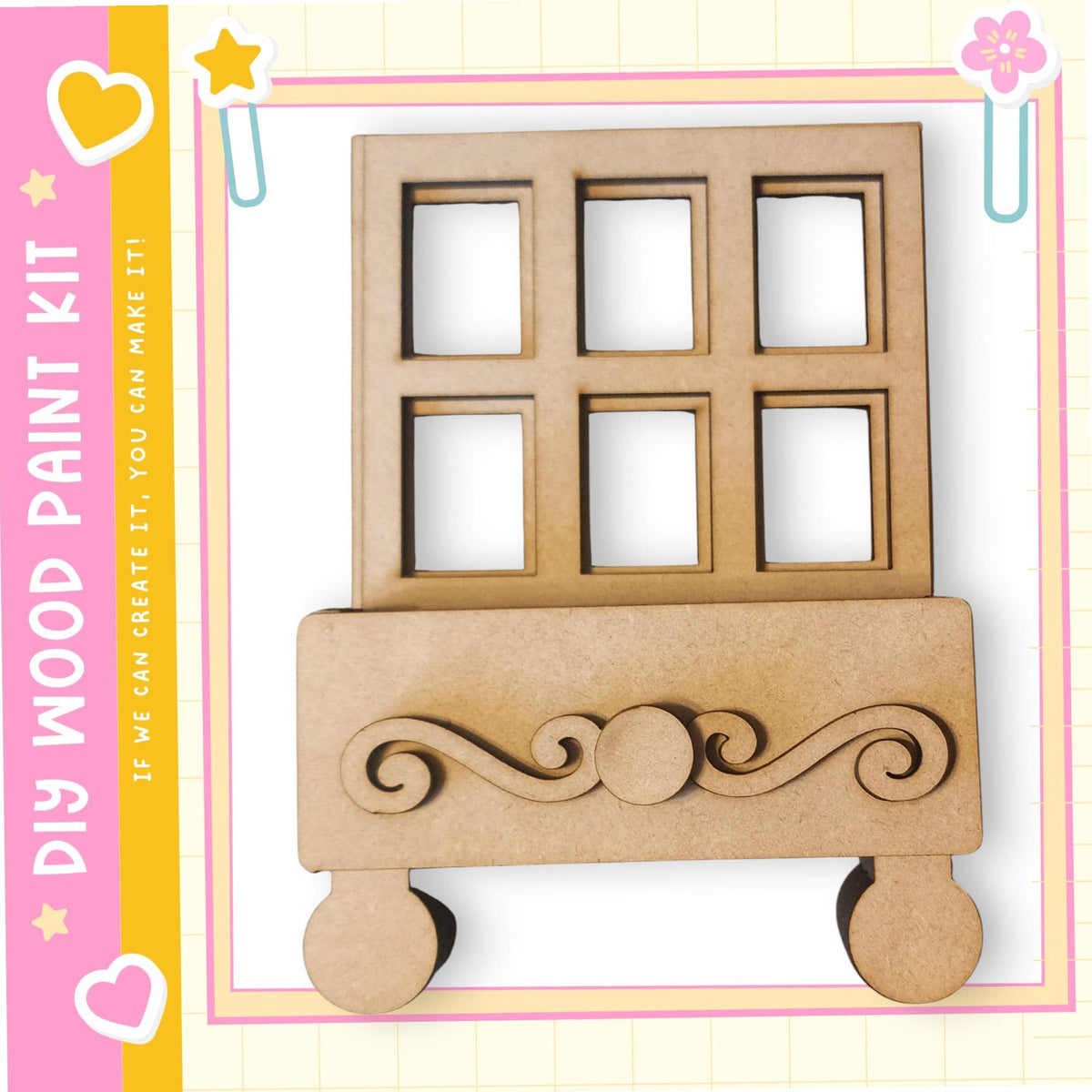 a wooden cutout with a decorative design, placed against a pink and yellow background with a heart and star motif.