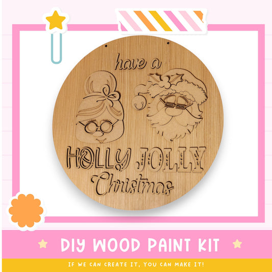 a wooden christmas ornament with a picture of a sheep