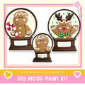 three wooden gingerbread man figurines, each with a unique design and color, displayed in a decorative arrangement.