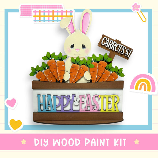 a picture of a bunny sitting in a basket of carrots