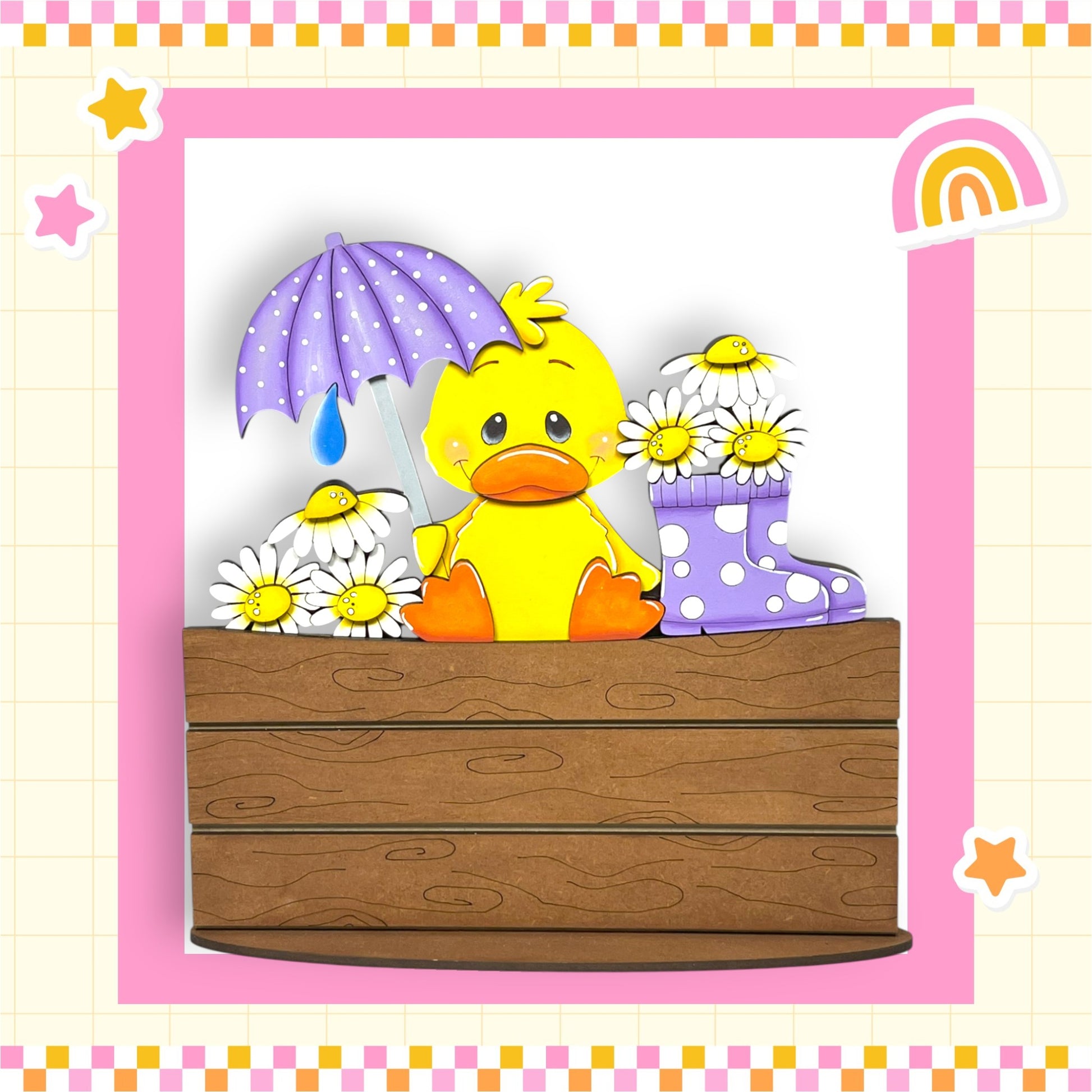 A yellow duck holding a purple umbrella and surrounded by white daisies and purple polka dot boots, sitting on a wooden bench.