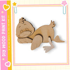 A wooden cutout of a cartoon duck is shown in the image.