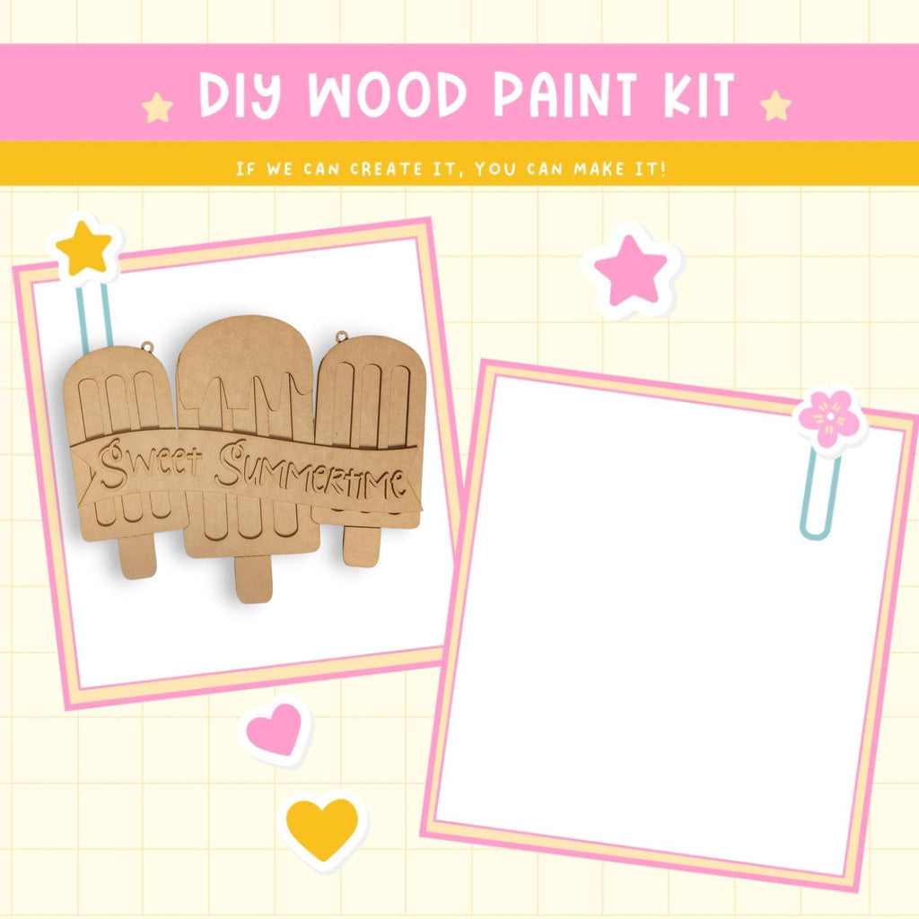 a wooden cutout of two elephants on a table