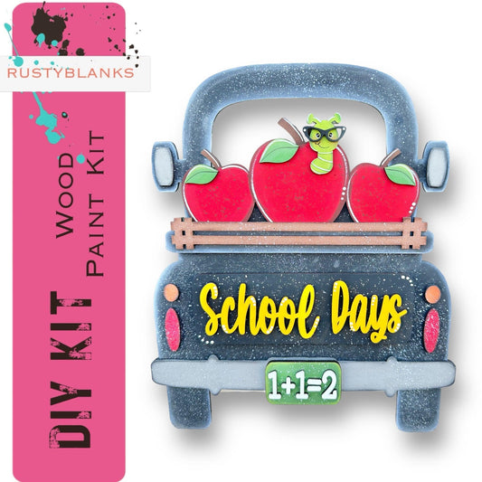 a picture of a school bus with apples in the back