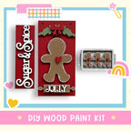 a picture of a gingerbread man and a cookie cutter