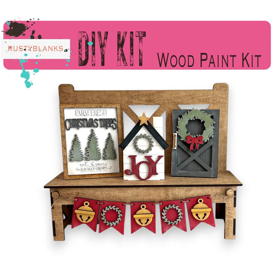 a wooden bench with christmas decorations on it