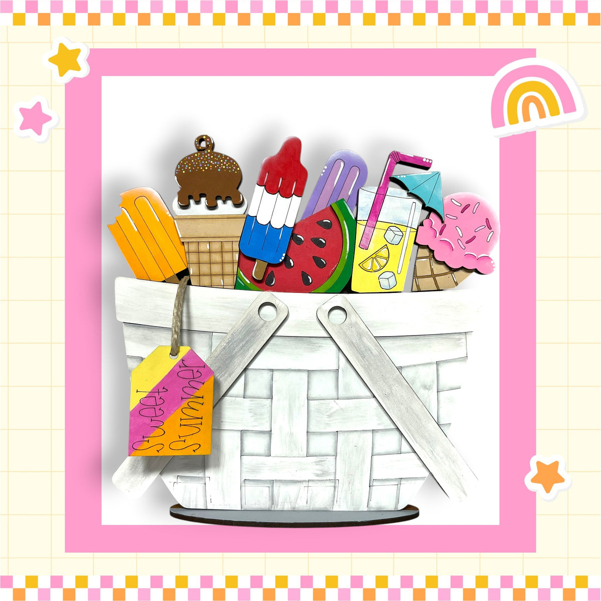 A basket filled with various colorful and whimsical summer-themed objects, including popsicles, ice cream, and a rainbow, set against a pink and yellow checkered background.