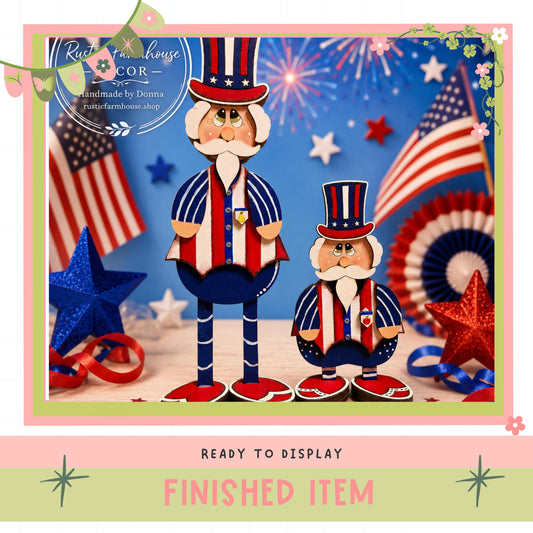 two wooden figures dressed in patriotic attire, including hats and suits, set against a backdrop of American flags and fireworks. The text "RUSTY & HOUSE" and "COR" is visible, along with the phrase "finished item" at the bottom of the image.