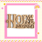 a wooden sign that says hopp into spring