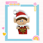 A cheerful cartoon elf wearing a Santa hat and holding a gift box, surrounded by colorful stickers and a rainbow-colored background.
