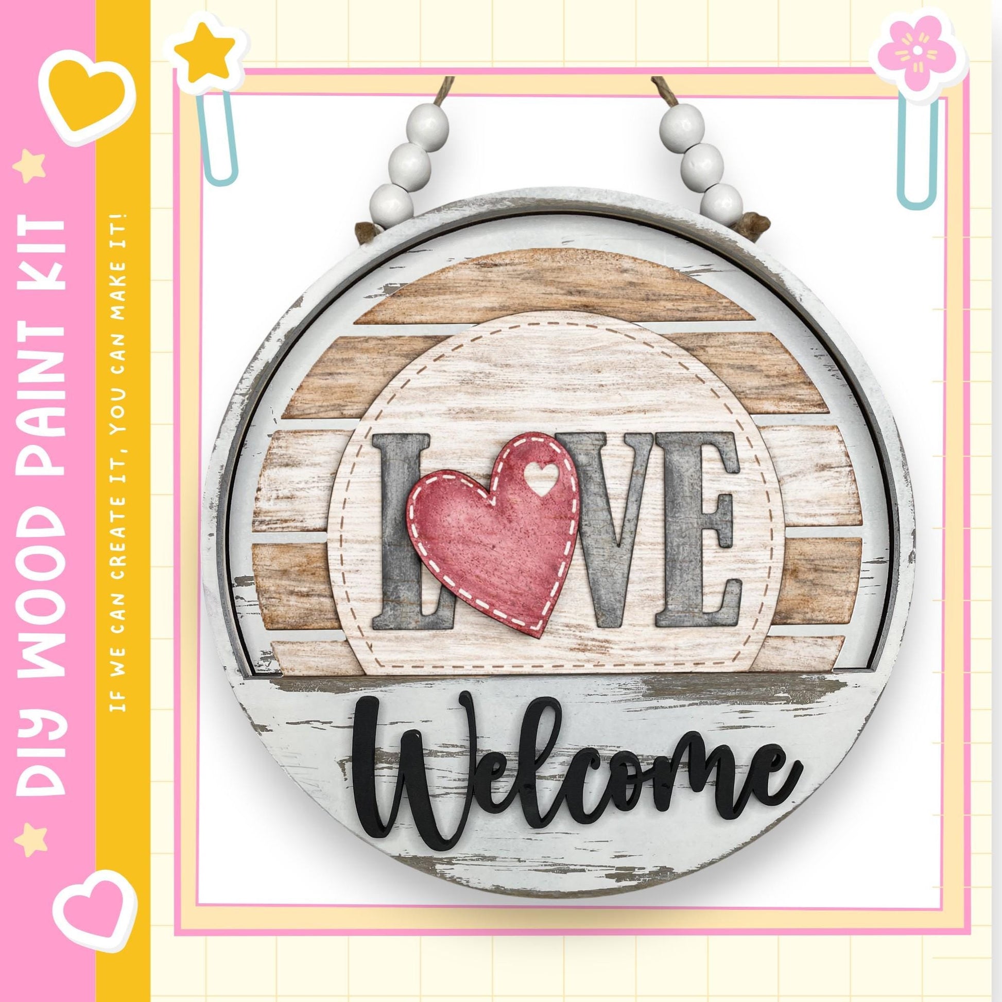 a wooden sign with the word "Love" and the word "Welcome" written on it. The sign is hanging on a wall and has a heart-shaped cutout in the center.