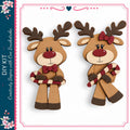two wooden reindeer figures, one holding a candy cane, against a white background.