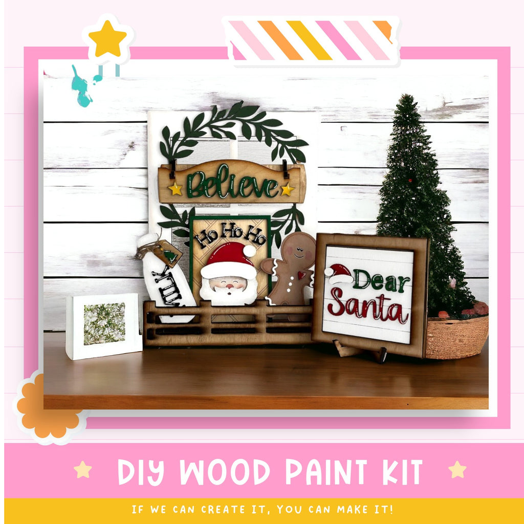 a picture of a wooden santa sign and other christmas decorations