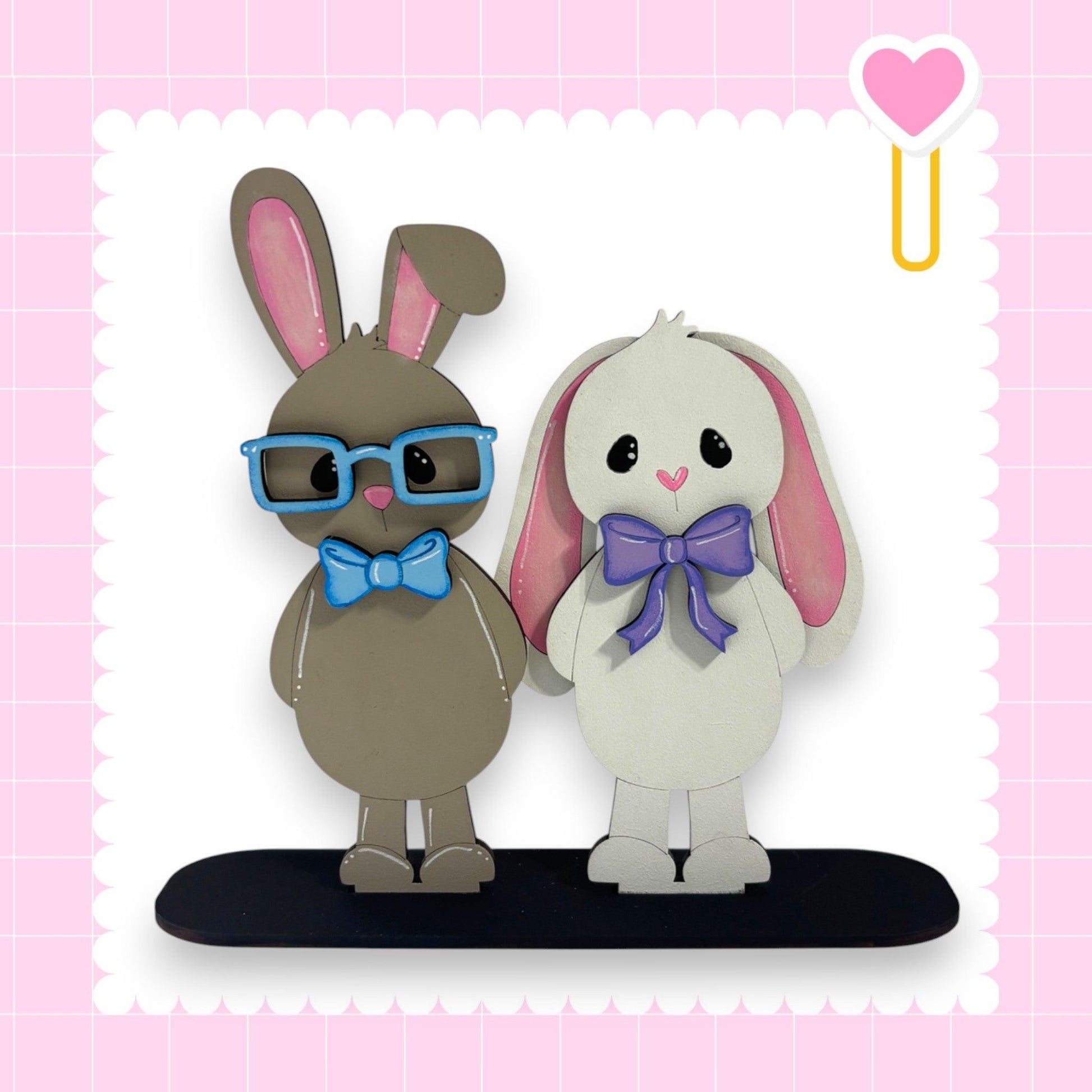 a couple of stuffed animals standing next to each other