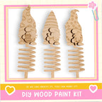 three wooden gnome-shaped ornaments, each with a unique design, displayed against a white background.