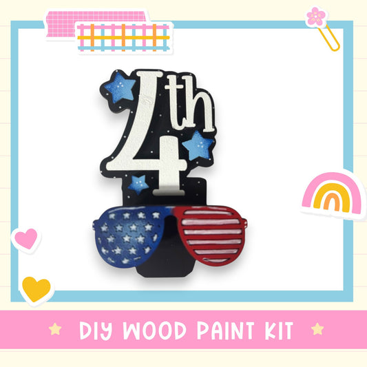 a DIY wood paint kit with a pair of sunglasses and stars as the main decorative elements.