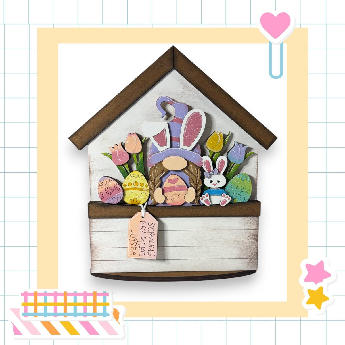 a card with a picture of a house with easter decorations