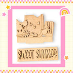 a wooden stamp with a picture of a mouse