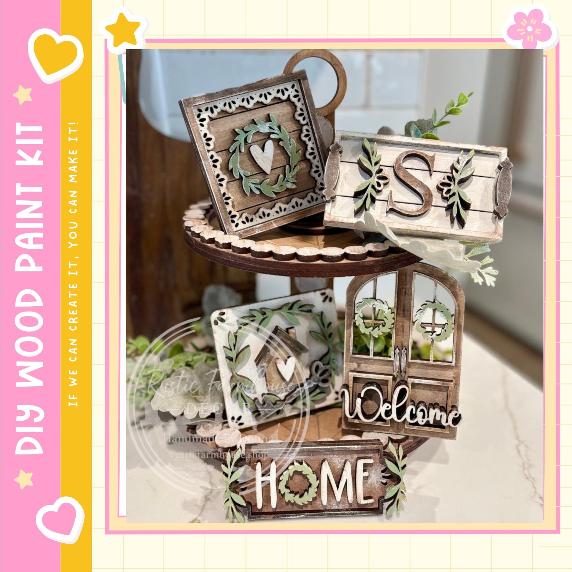 a wooden tray with various decorative items, including a wreath, a sign with the letter "S", and a "Welcome" sign. The tray is placed on a table, and there are additional decorative elements such as leaves and flowers surrounding it.