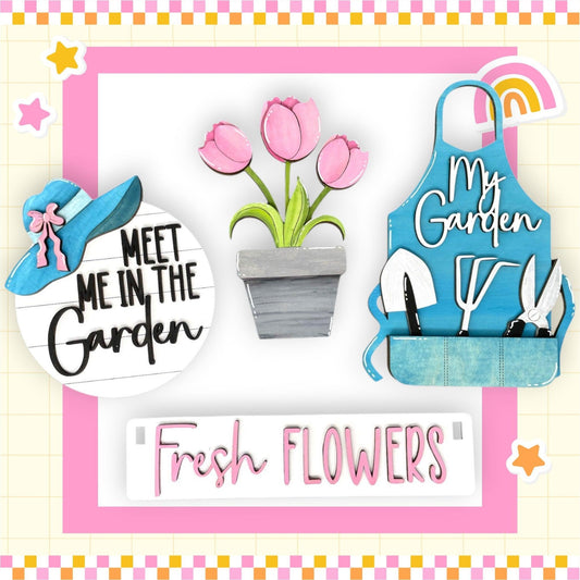 a pink and white card with flowers and a potted plant