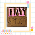 a picture of a sign that says hay spring