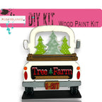 a white truck with trees on the back of it