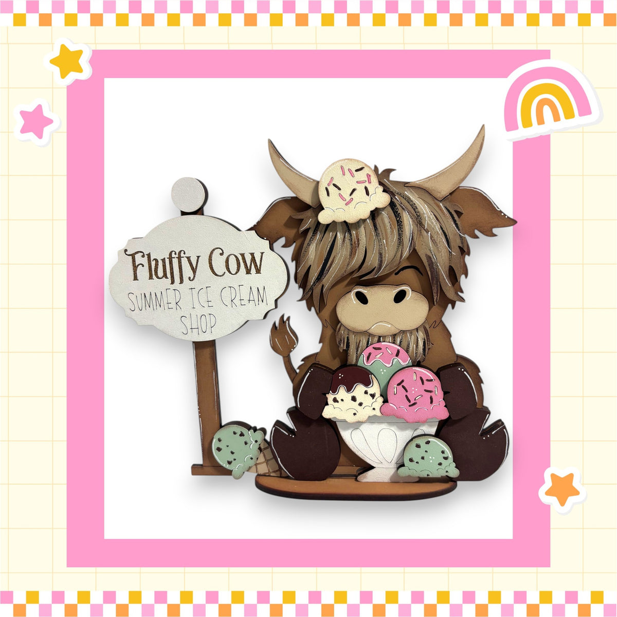 Fluffy Cow, a wooden cow figurine, is sitting on a wooden base and holding a sign that says "Fluffy Cow Summer Ice Cream Shop".