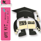 a paper cut out of a graduation cap and gown