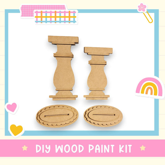 The image is a DIY wood paint kit, featuring two wooden pillars and two wooden stands, all made of cardboard.