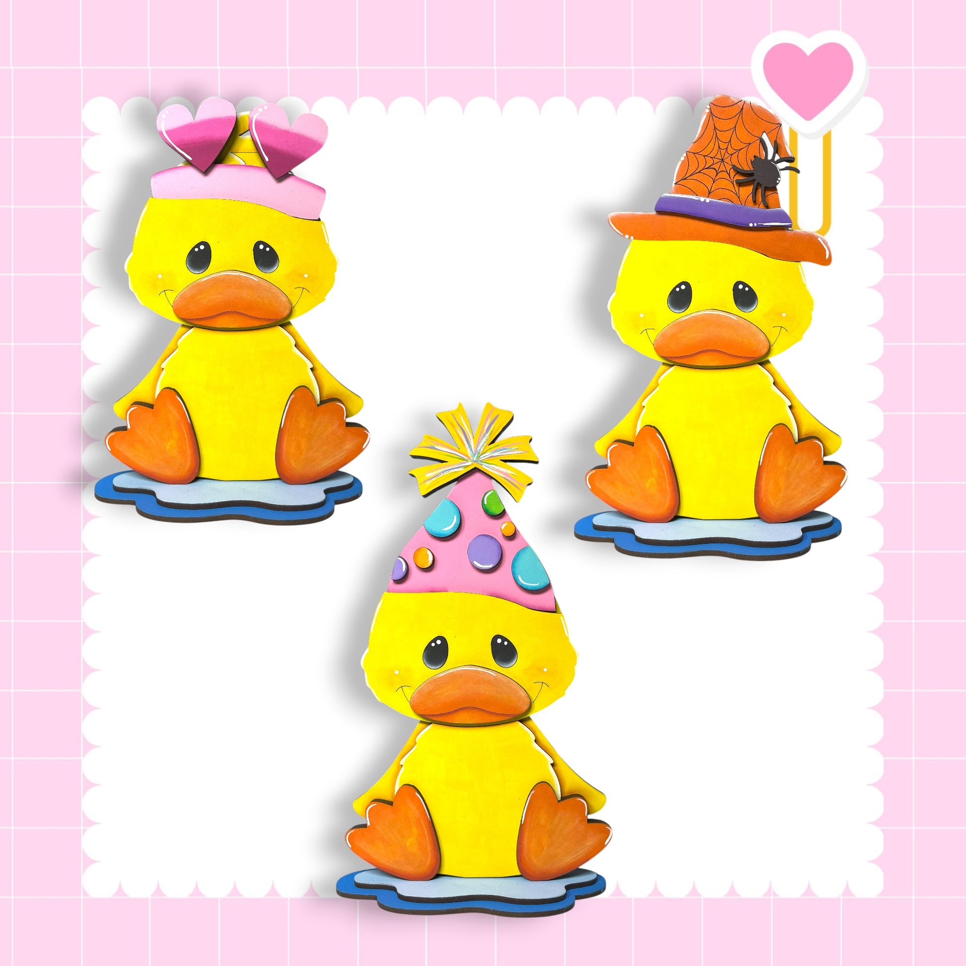 three cheerful yellow duck characters wearing party hats and sitting on a pink background.