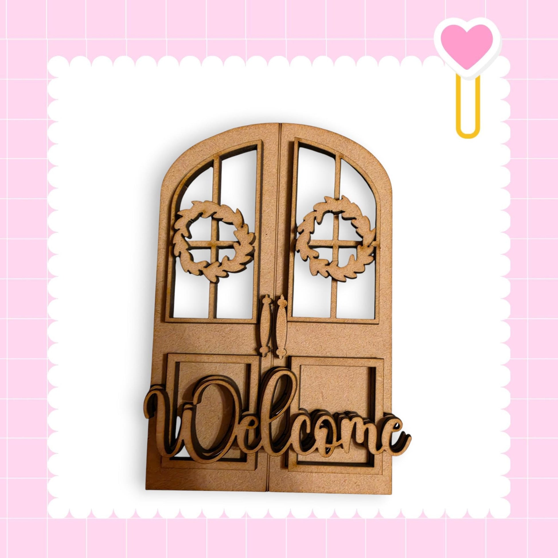 a wooden door with a wreath and the word "Welcome" written on it.