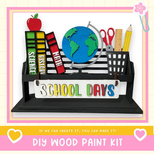 a picture of a school days sign with school supplies