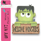 a sign with a cartoon character holding a sign that says welcome monsters