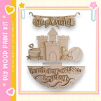 The image is a wooden paint kit featuring a castle, beach ball, and sandcastle, along with the text "Sun & Sand" and "beach days are the best days".