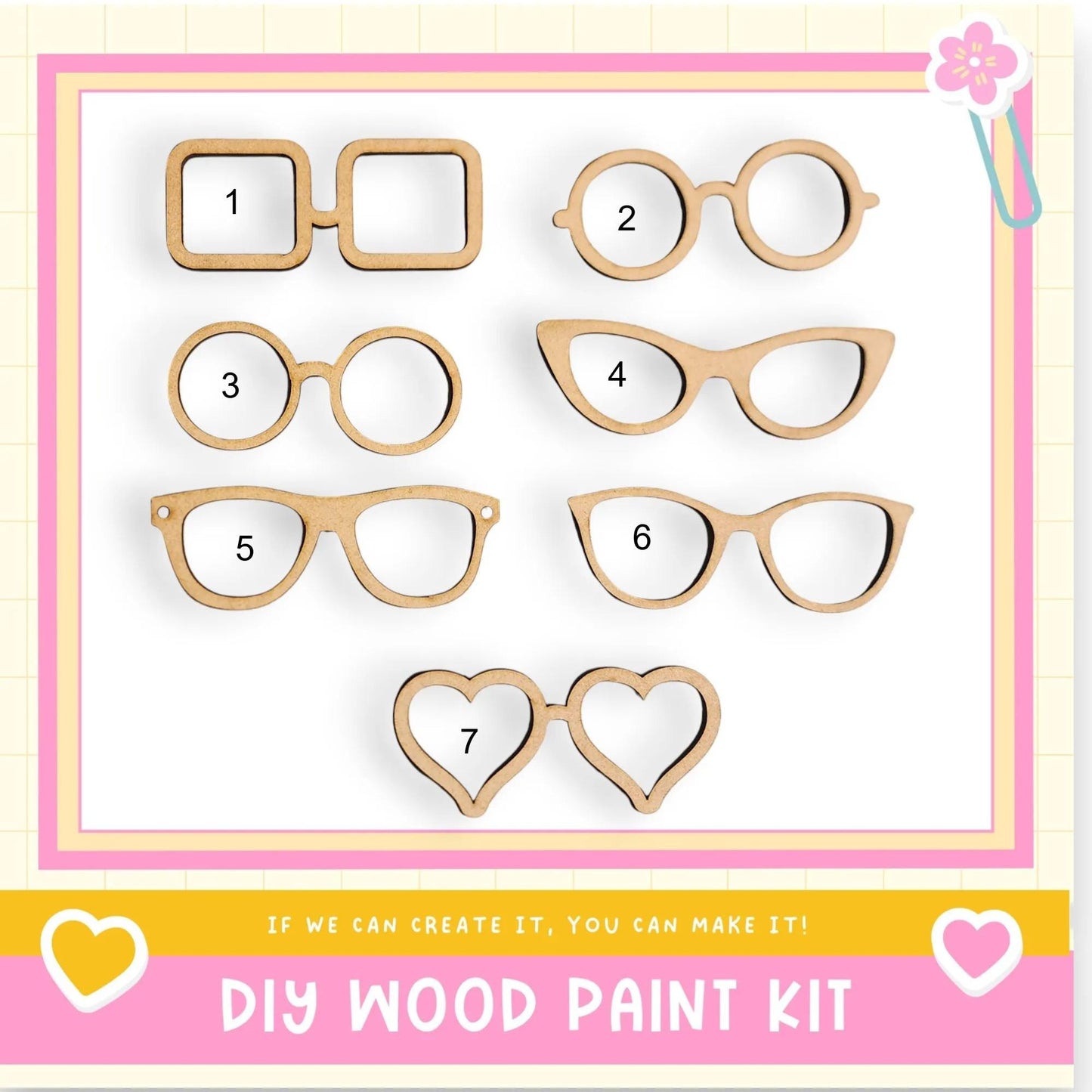 a DIY wood paint kit with various wooden shapes, including glasses, hearts, and other decorative elements, arranged on a white background.