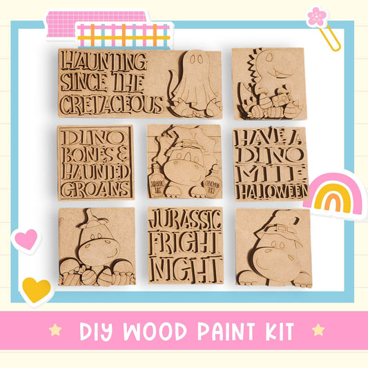 The image is a DIY wood paint kit featuring various carved wooden shapes, including a skeleton, a dinosaur, and a cat, along with text that says "HAUNTING SINCE THE CRYSTACEOUS", "DINO BONES & HANUCED GROANS", "JURASSIC FRIGHT NIGHT", and "HAVE A DINO MICE HALLOWEEN".
