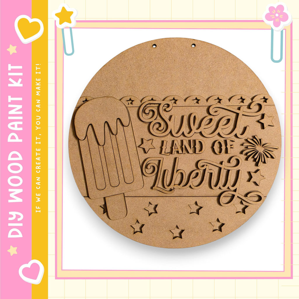 a wooden sign with the text "Sweet Land of Liberty" carved into it, along with a decorative ice cream cone.