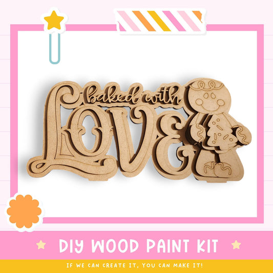 The image is a DIY wood paint kit for creating a wooden sign with the phrase "baked with love".