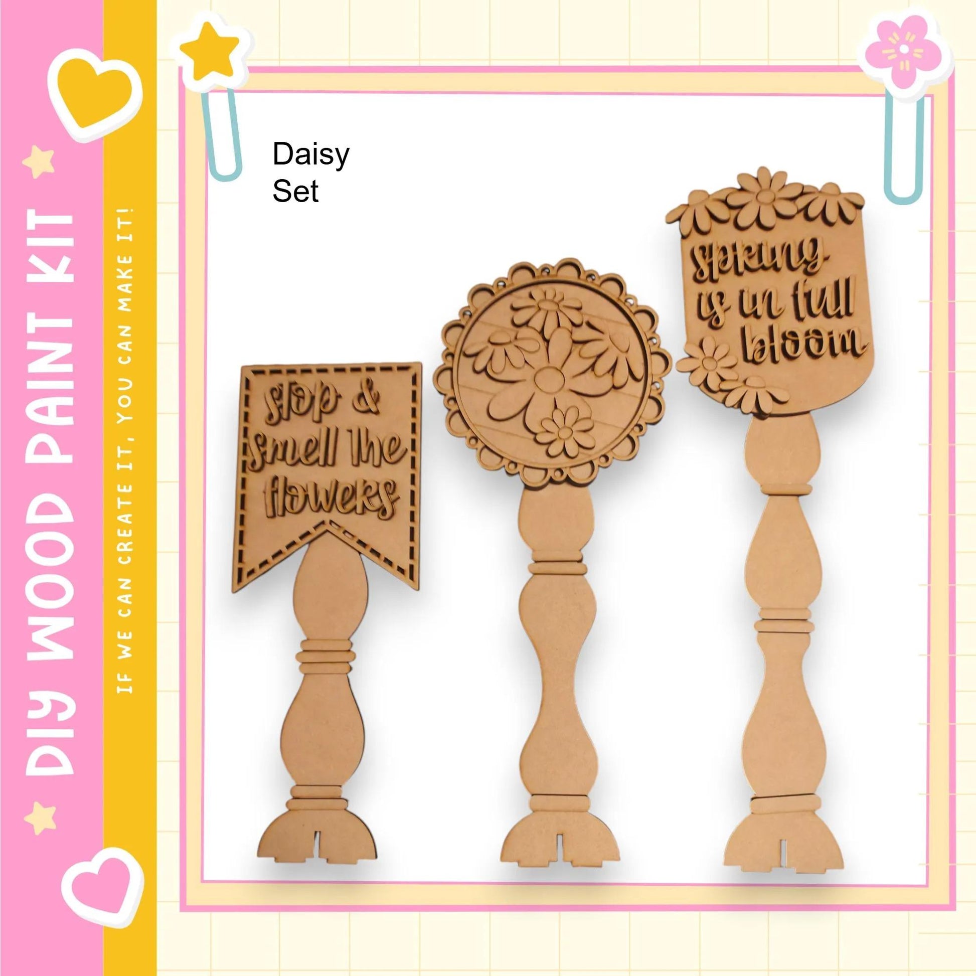 three wooden signs with text and floral designs, arranged in a row.