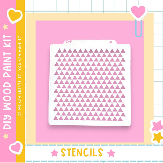 a DIY wood paint kit with a pink background and a white stencil with a pattern of pink triangles.