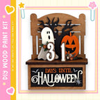A Halloween-themed display with a wooden bench, a ghost, a jack-o-lantern, and a sign that says "31 DAYS UNTIL HALLOWEEN".