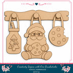 a DIY kit for creating wooden ornaments, including a Christmas tree ornament, a cookie ornament, and a nut-shaped ornament.