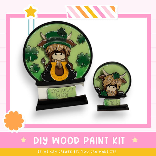 a picture of a wooden paint kit with a picture of a girl and a boy
