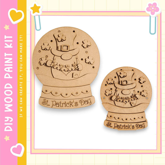 two wooden snow globes with the text "St. Patrick's Day" written on them.