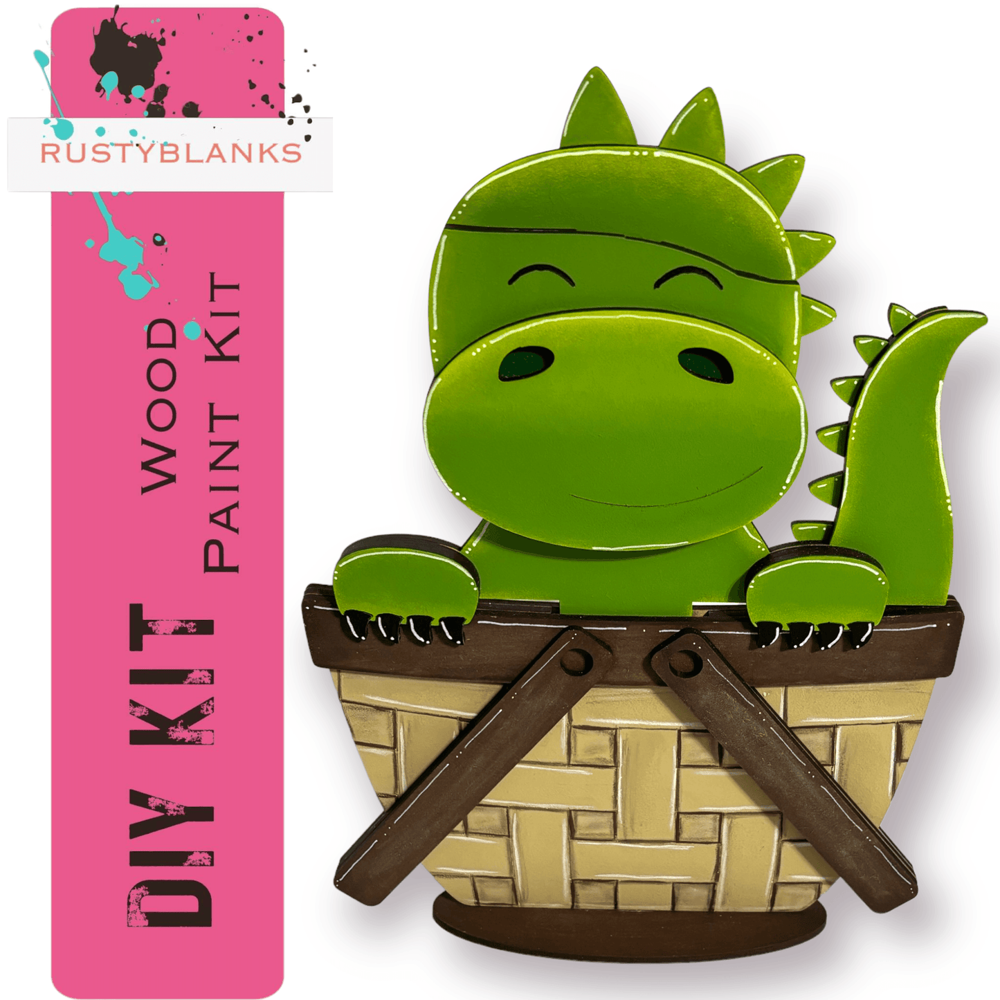 a paper cut out of a green dragon sitting in a basket