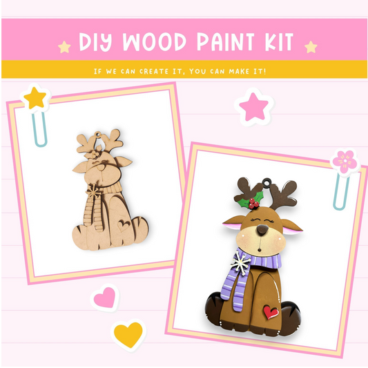 The image is a DIY wood paint kit featuring two wooden reindeer ornaments. The kit appears to be designed for creating these ornaments, as indicated by the text "DIY WOOD PAINT KIT" and "If we can create it, you can make it!" The kit includes the necessary materials and instructions for crafting the wooden reindeer ornaments.
